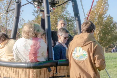 Two guests are seen from behind as they walk together.