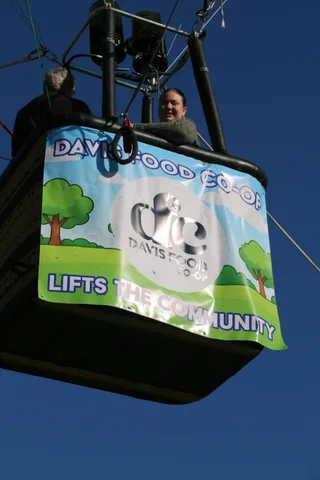 A cropped close view of the basket banner reading Lifts the Community.
