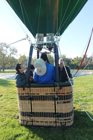 The burner ignites above the group in the basket.