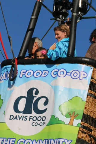 A close, legible view of the Davis Food Co-op banner and tree logo.