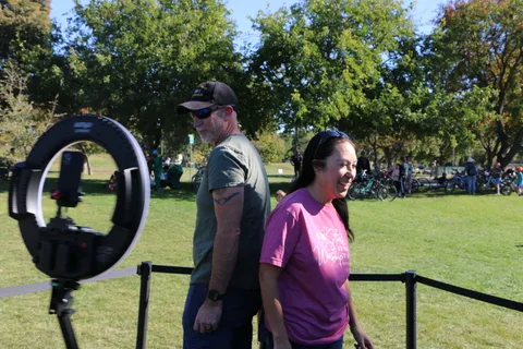 Attendees pose in the park at the Davis Zombie Bike Ride