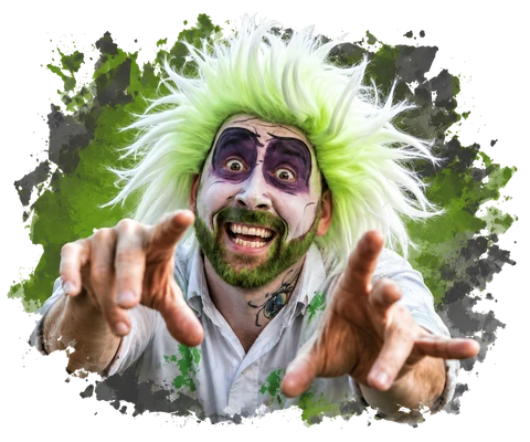 Aaron Wedra in full zombie makeup: bright green wig, purple and white face paint, grinning and reaching both hands towards the camera.