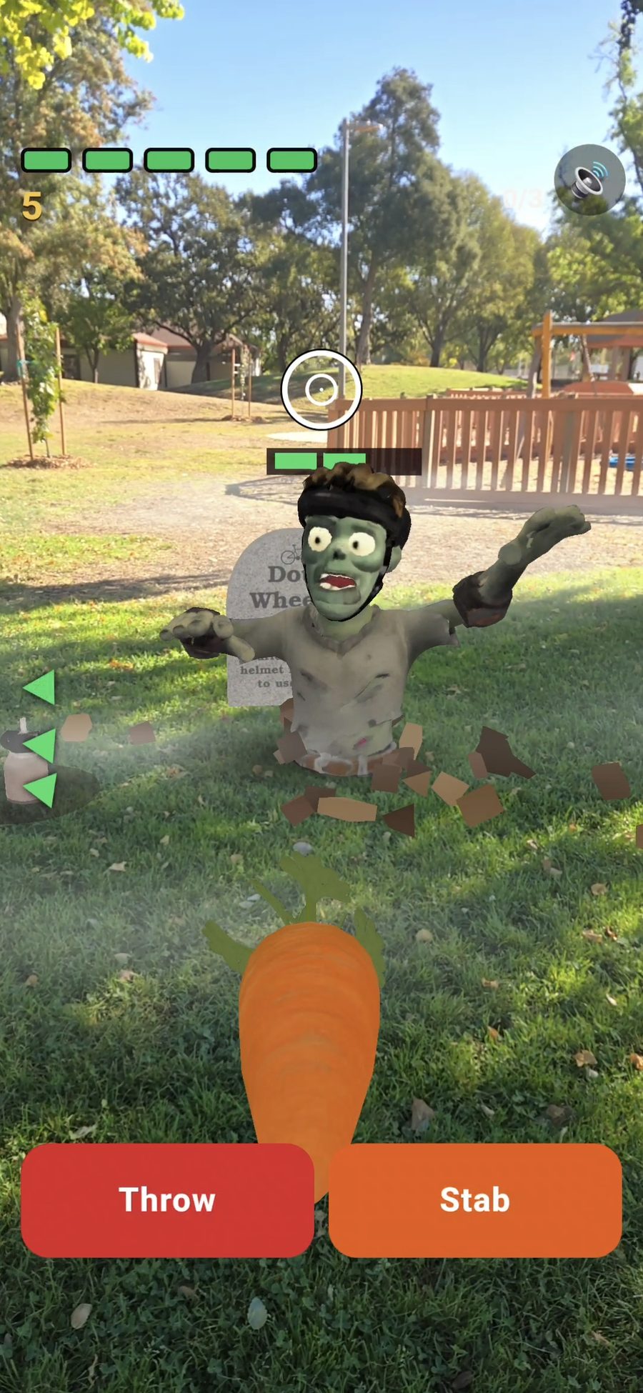 Augmented reality zombie at Community Park with a carrot ready to throw, and Throw and Stab buttons on screen.