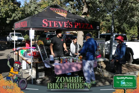 Guests line up at the Steve's Pizza food tent.