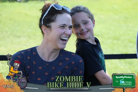Two women share a laugh together at the festival.