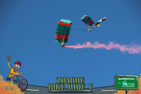 Two red and green parachutes trail pink smoke together across the sky.