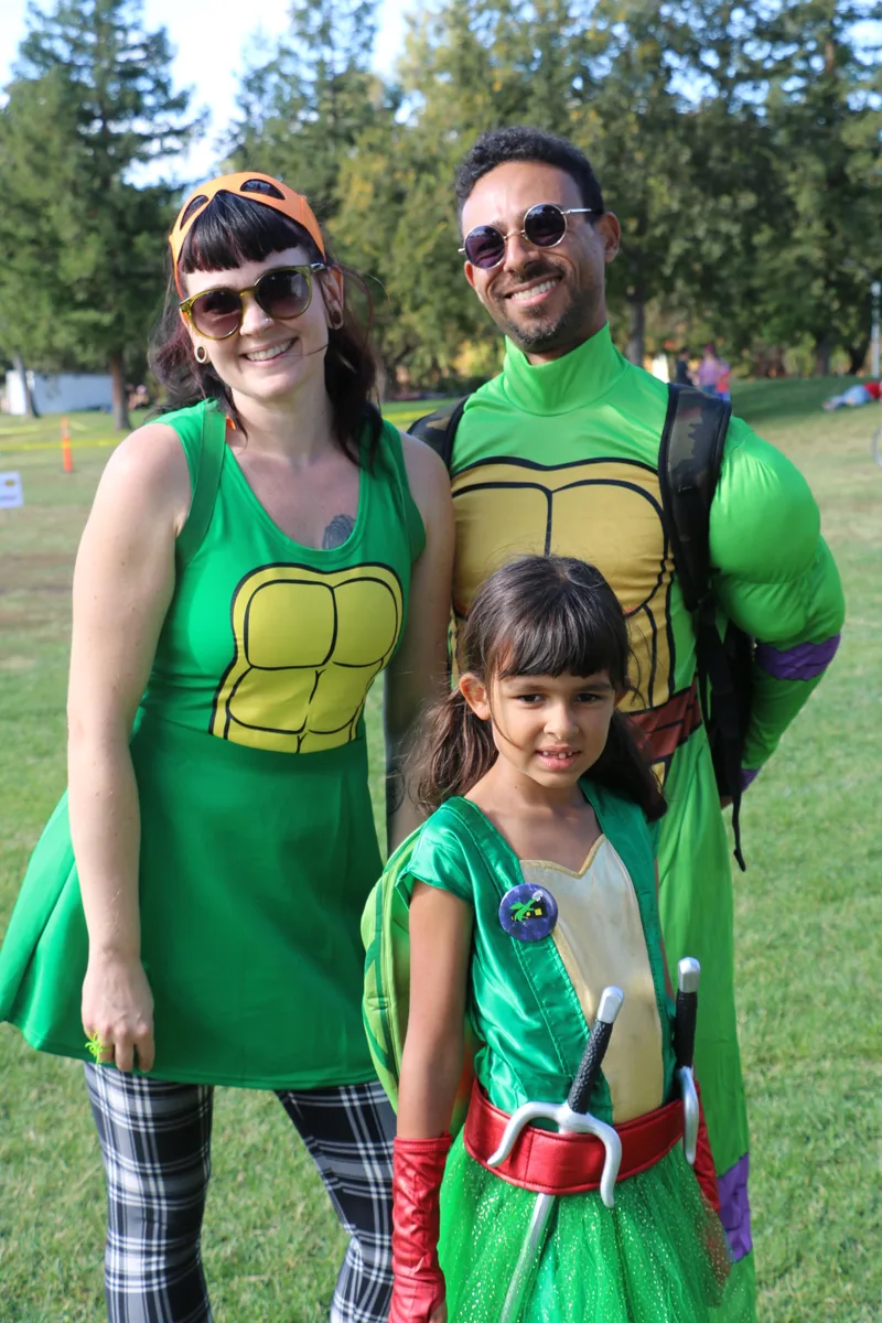 A family in matching costumes at the festival