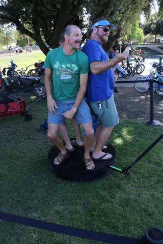 Two men make silly faces for the camera at the festival.