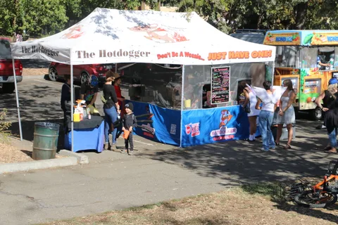 The Hotdogger food booth stands ready at the festival.