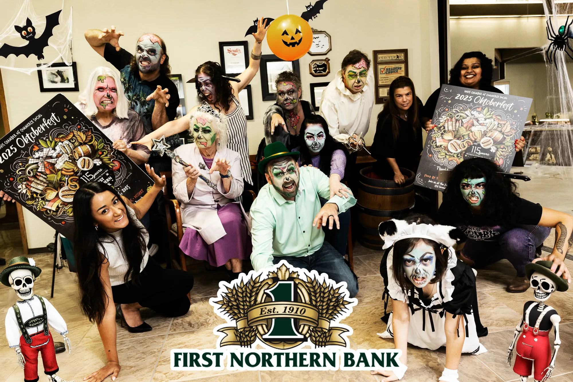 A large costumed office group poses together with a First Northern Bank logo overlay.