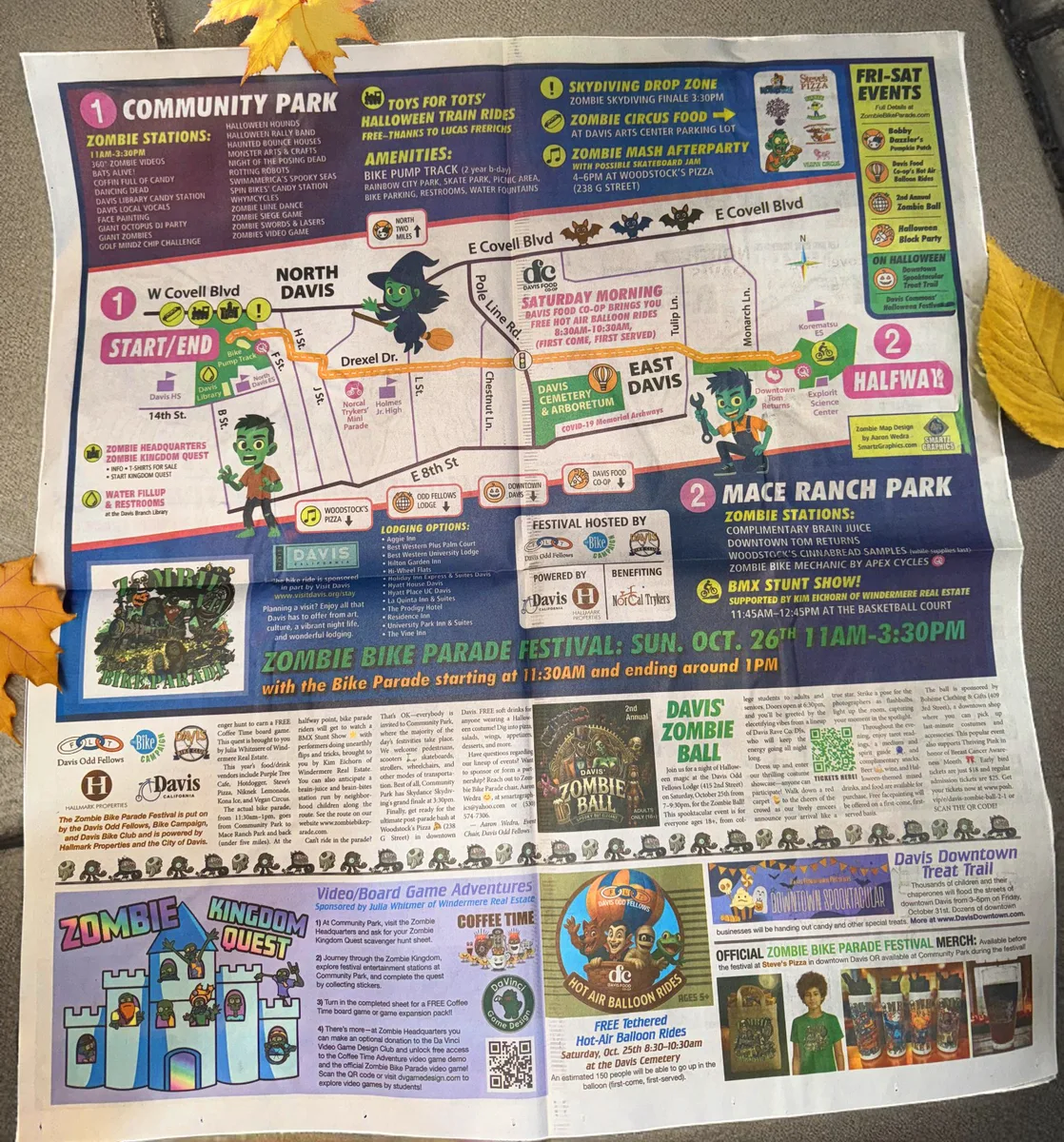 A scanned newspaper page showing the Zombie Bike Parade festival map and schedule.