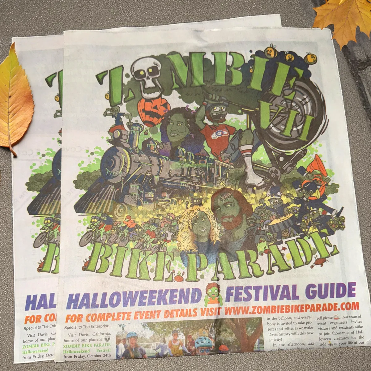 A scanned newspaper page for the Zombie Bike Parade Halloweekend Festival Guide.