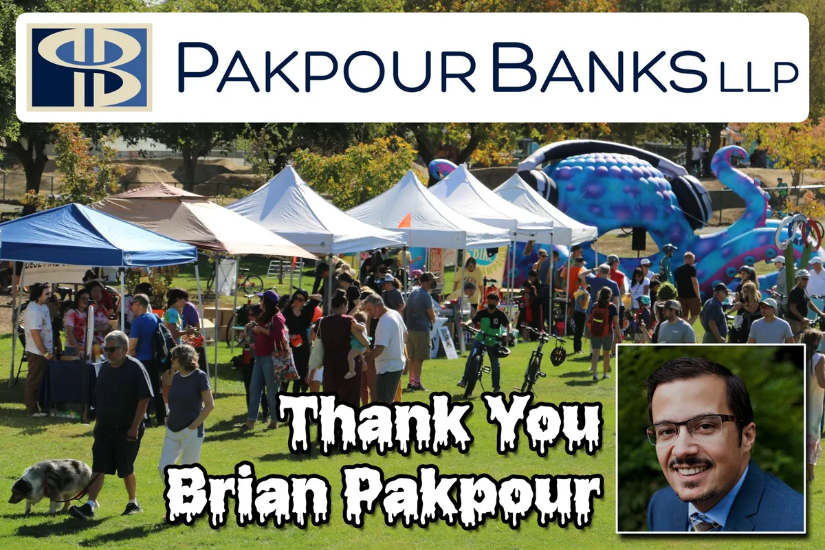 Festival goers browse booth tents in the park with a sponsor thank you caption below.